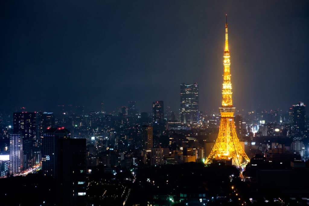 Tokyo Tower glowing over the Tokyo skyline at night