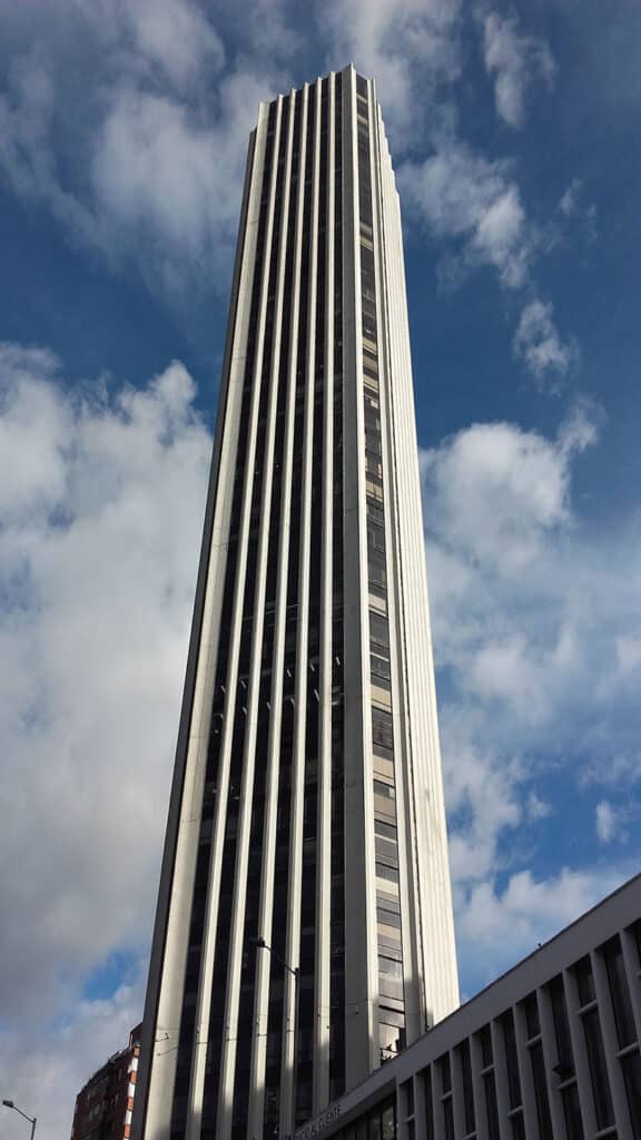 Torre Colpatria illuminated at night in Bogotá, Colombia