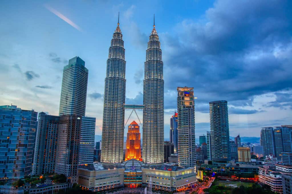 Evening view of the Petronas Towers at KLCC, Kuala Lumpur, Malaysia.