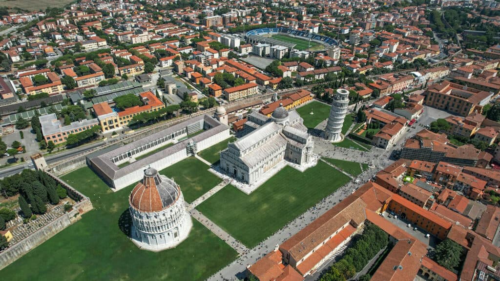 Aerial view of the Leaning Tower of Pisa, showing its iconic tilt.