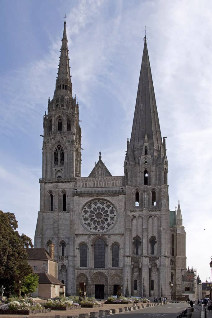 Facade of Chartres Cathedral with its distinctive twin spires.