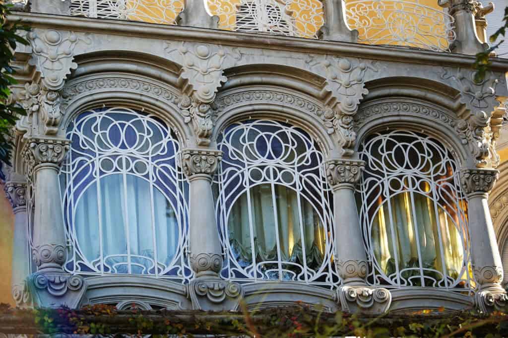 Ornate Liberty-style windows of Villa Scott in Turin.