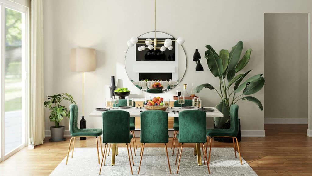 Dining room with green furniture and natural light.