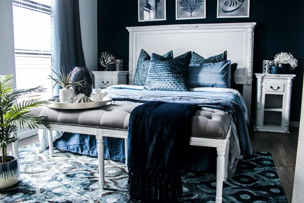 Layered patterns create harmony in bedroom design