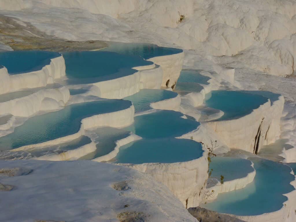 Pamukkale’s cascading white mineral terraces in Turkey.